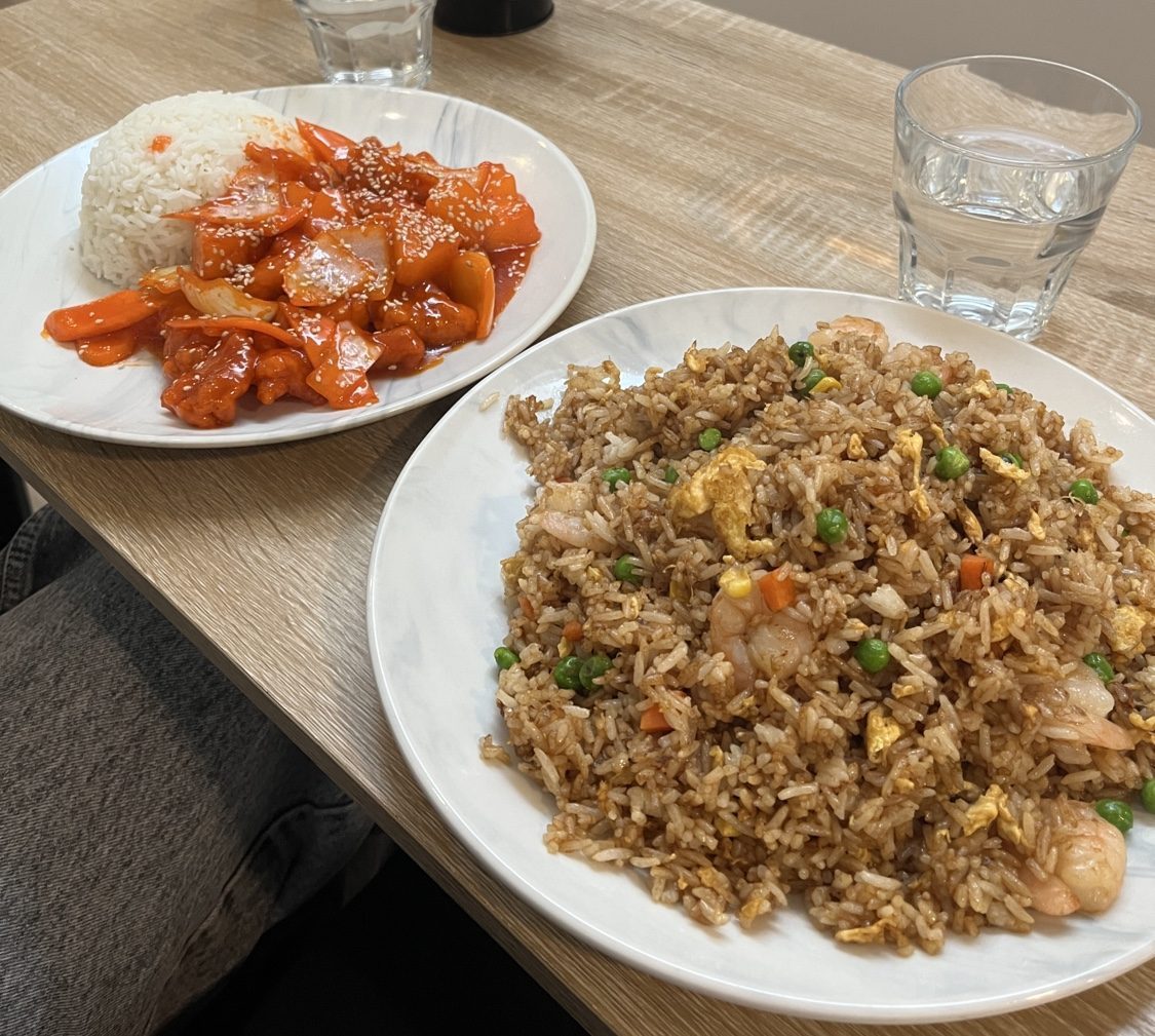 Fried rice and shared dishes on a table